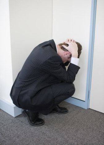 Business-man-fetal-position.jpg