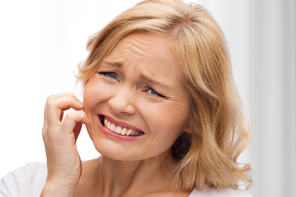 nz-itch_face_woman_1.jpg