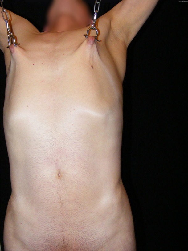 Hanging the slave by its tits