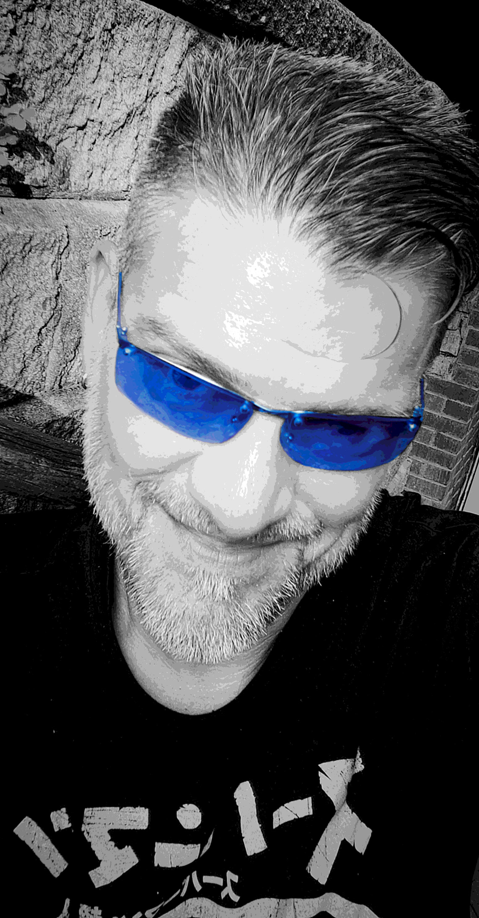 Posterised Blue Glasses Selfie