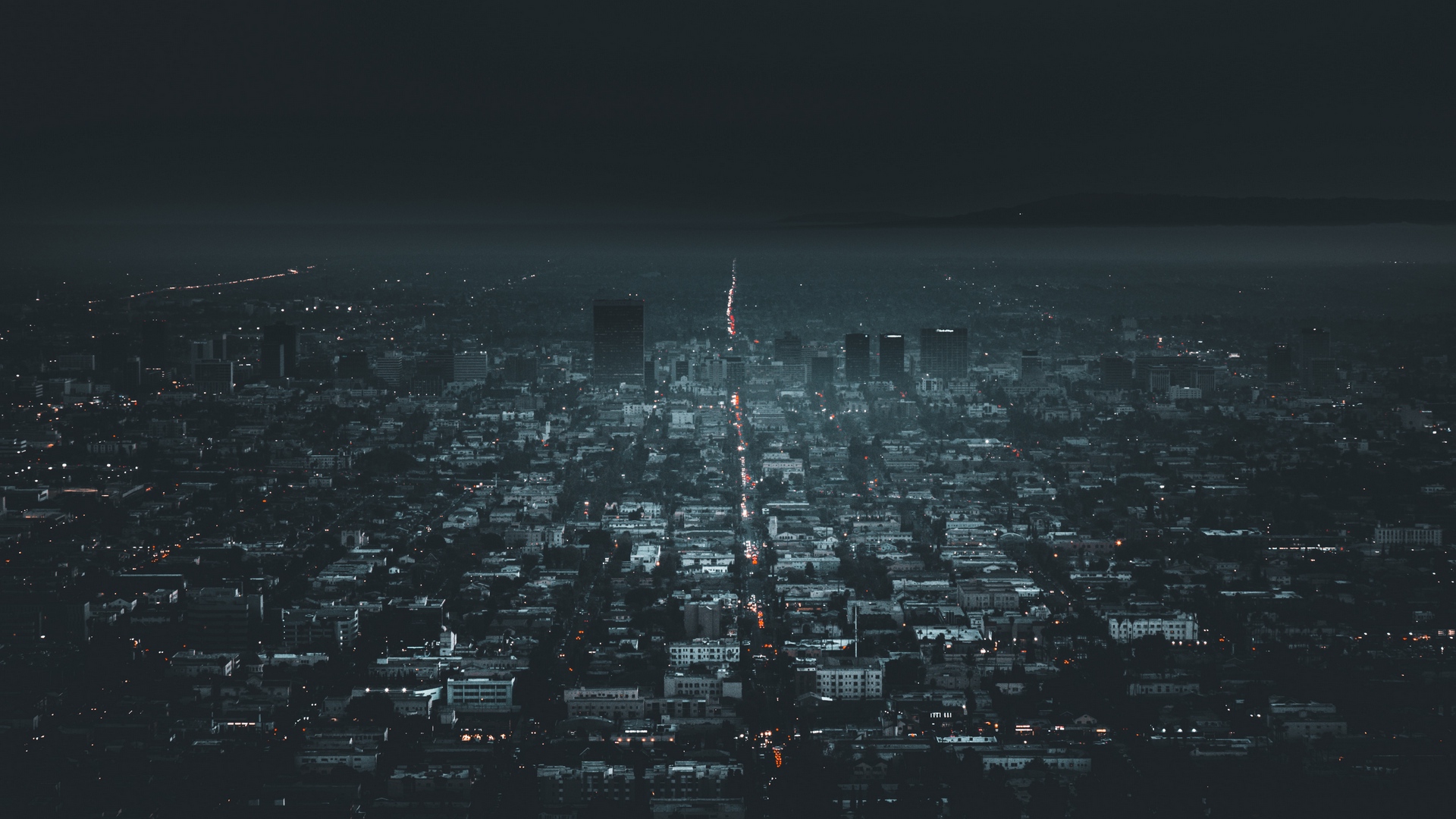 night_city_aerial_view_city_lights_131707_1920x1080.jpg