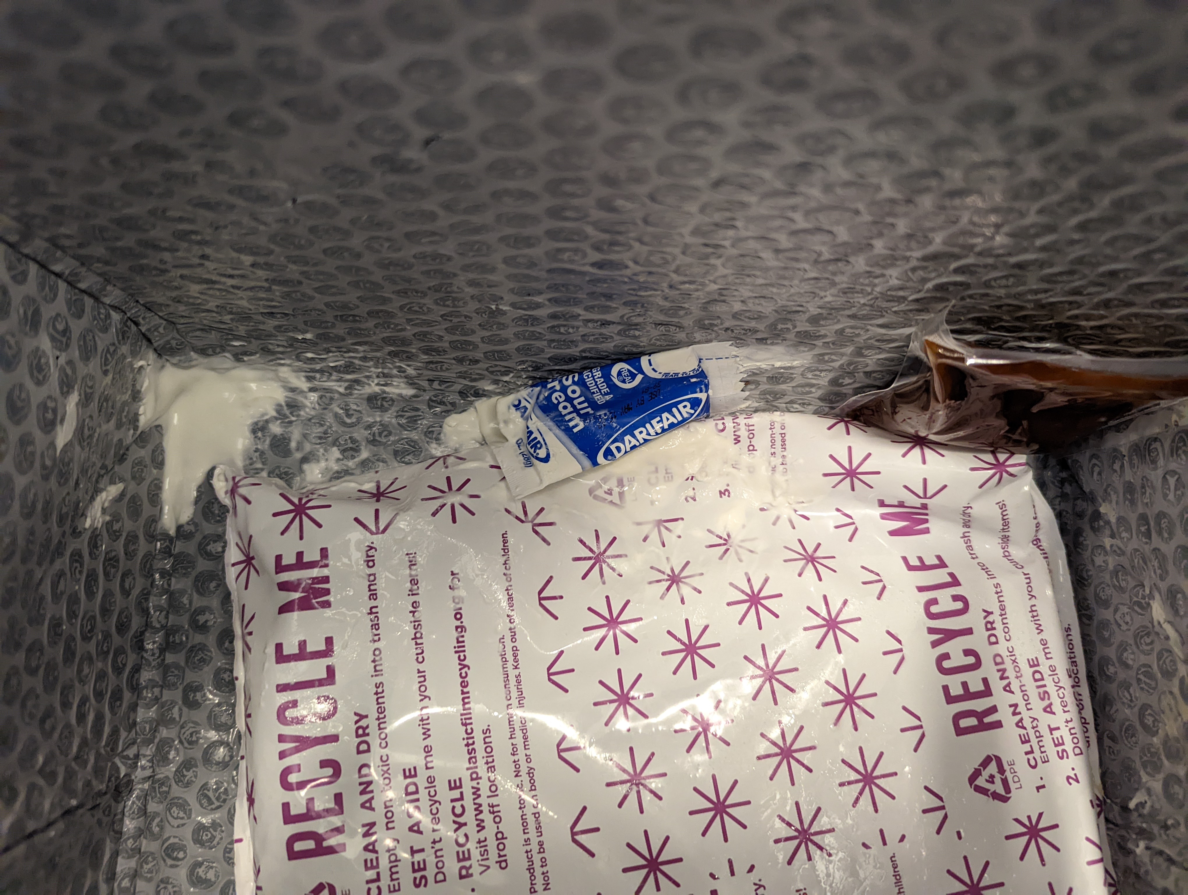 Smashed sour cream packet